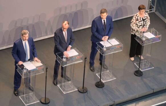 German coalition leaders brief the media after reaching an agreement between their parties on a new government.